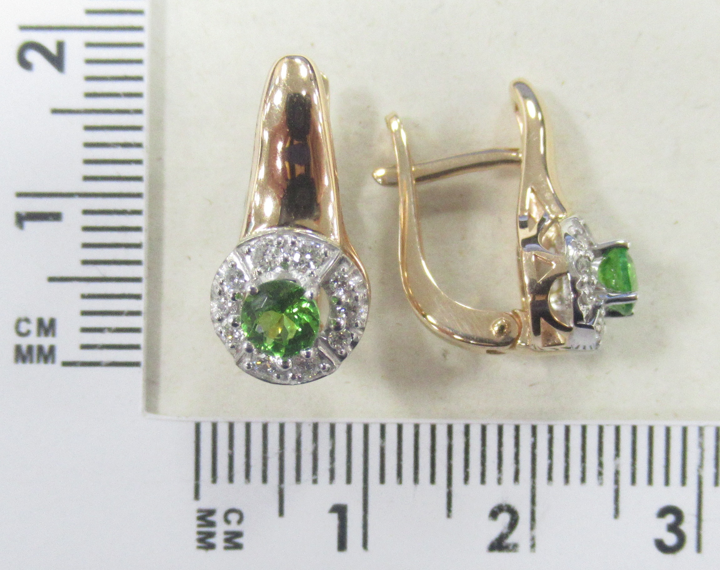 Золотые серьги 585 пробы; красное,белое золото; родий; вставки 8 Бр.Кр-57 0,188 3/6А; 4 Бр.Кр-57 0,0